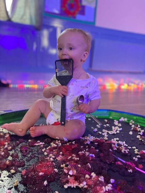 toddlers having messy fun